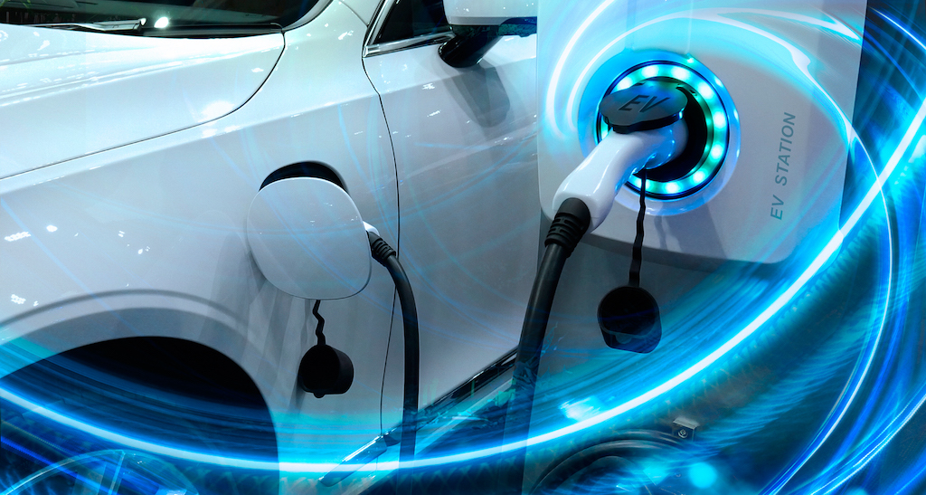 Ev,Car,Or,Electric,Vehicle,At,Charging,Station,With,The